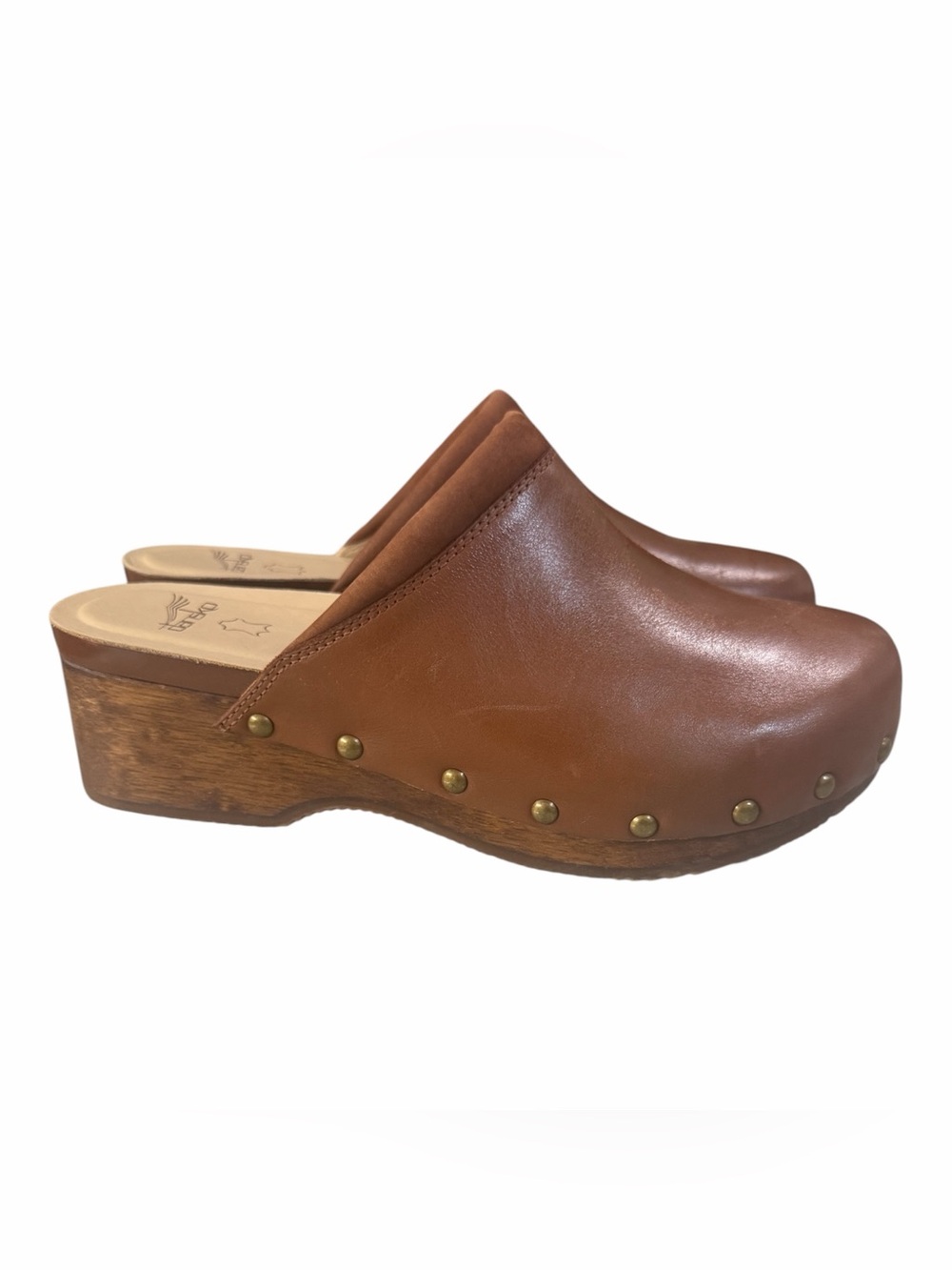Dansko’s Andie Leather Nail Head Brown Leather Clog Mules